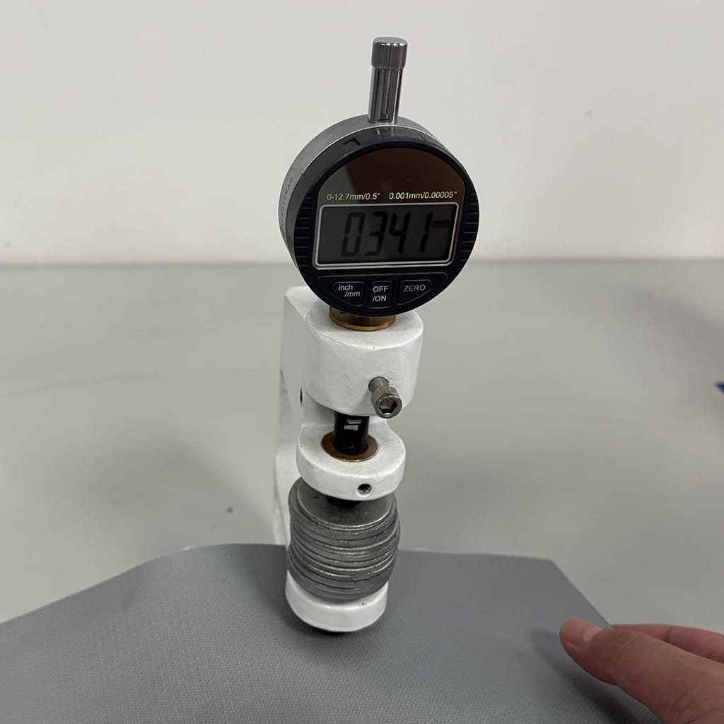 Silicone coated fiberglass cloth thickness inspection