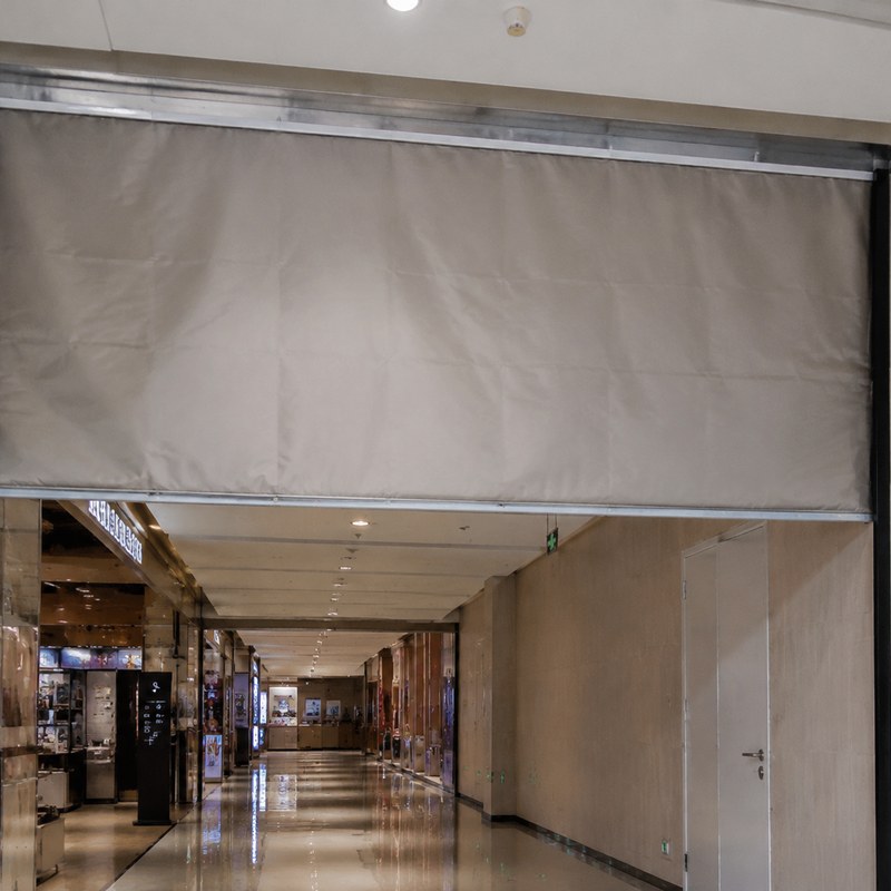 Fire curtains and barriers using silicone coated fiberglass fabric