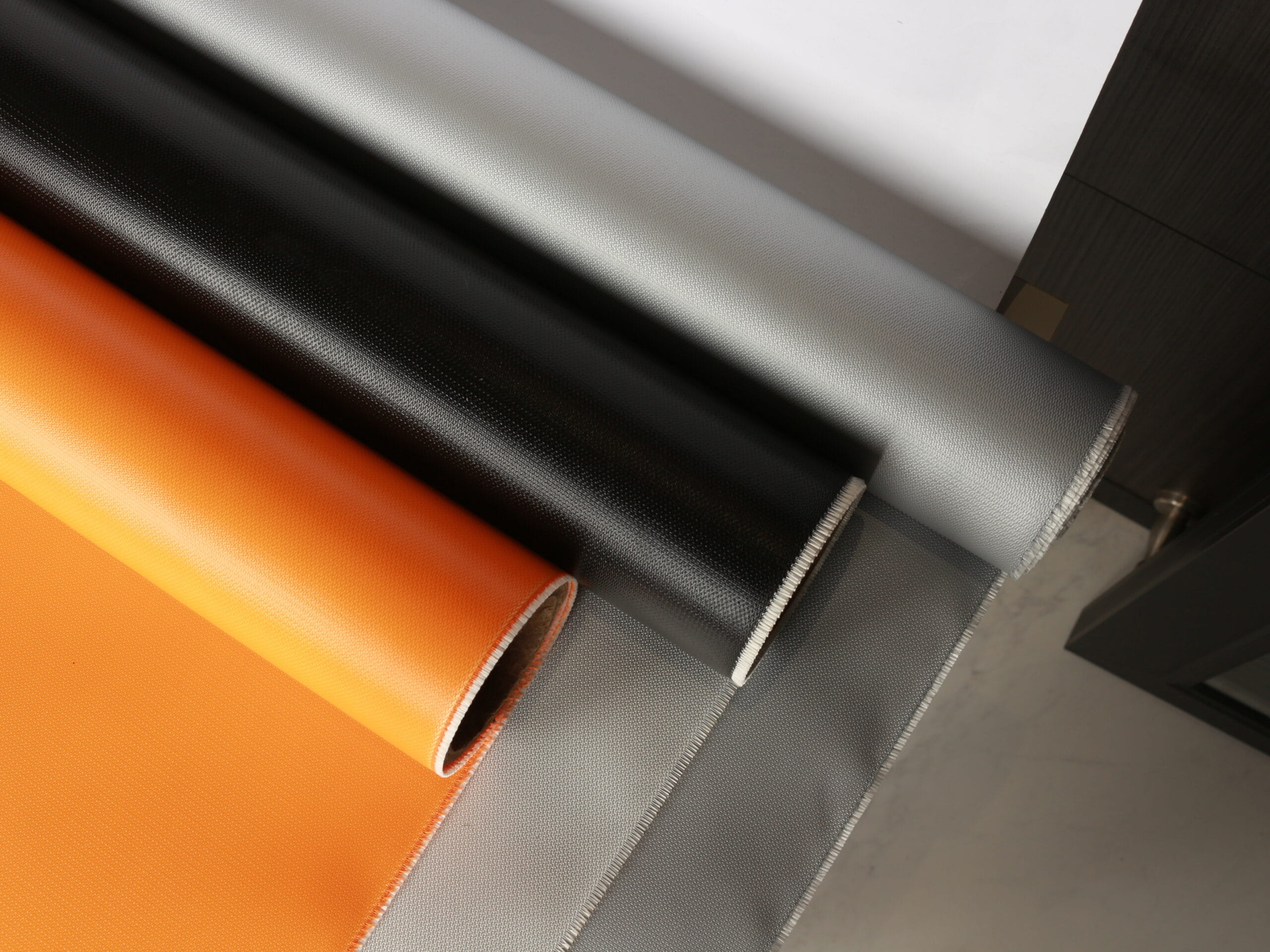 Silicone coated fiberglass fabric rolls in multiple colors for industrial heat and fire protection applications